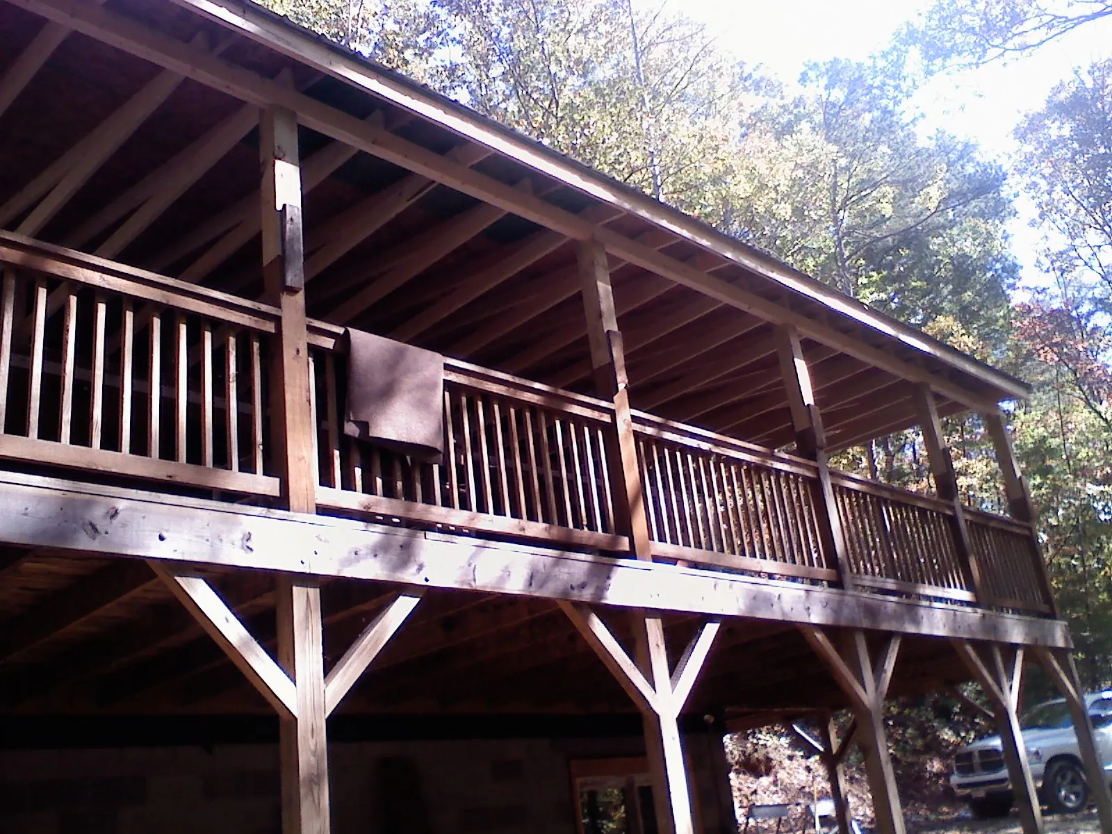 Timber framing under a new elevated porch and deck — Roof Leak Repair in Armington by Roofing Brothers